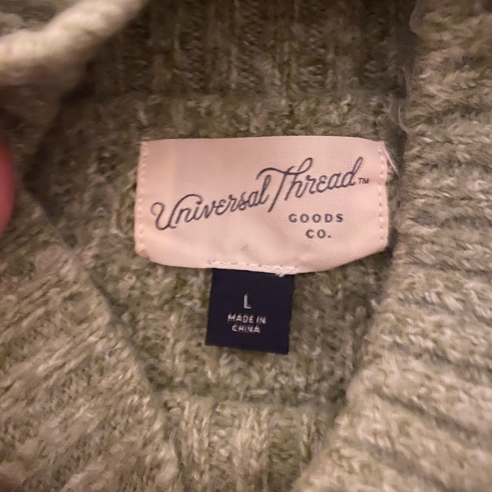 Green cable sweater